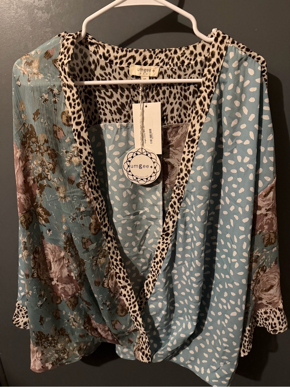 Umgee Mixed Print Wrap Blouse in Sky Blue with Leopard Trim